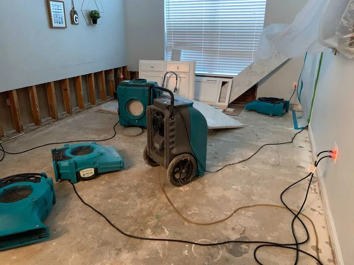 Dehumidifier in flood-cut room for Water Damage Restoration in Elfers